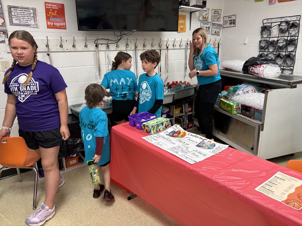 4th grade students working concession stand