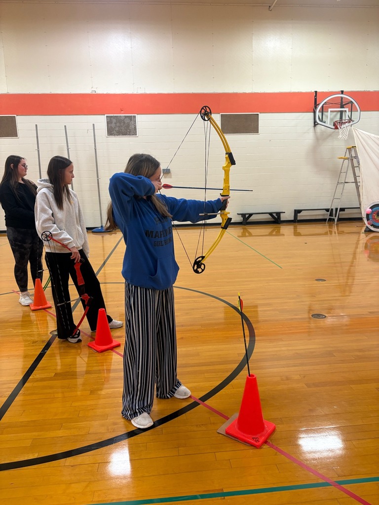 students shooting archery in Integrated Science