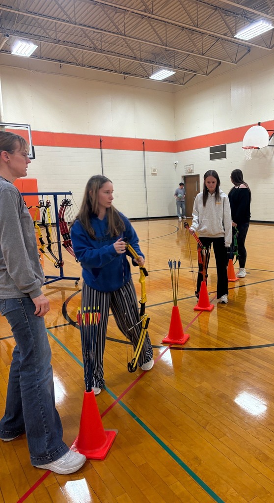 students shooting archery in Integrated Science