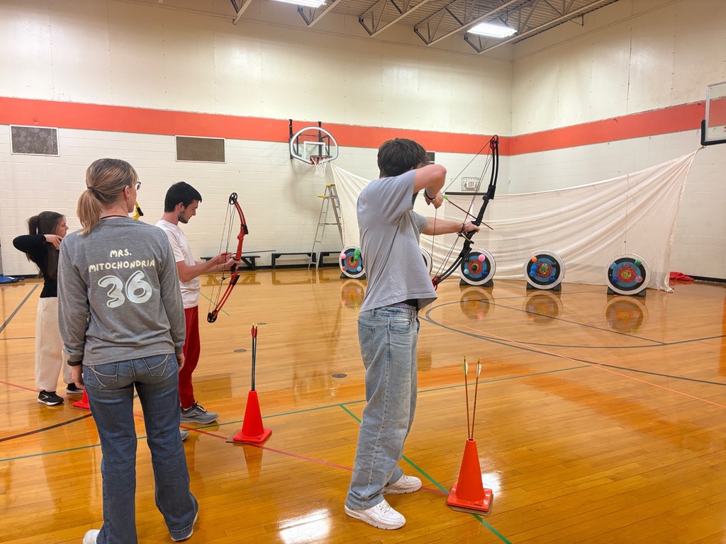 students shooting archery in Integrated Science