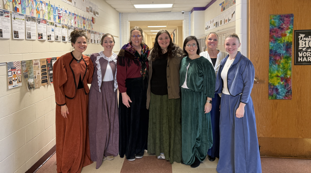 Staff members dressed up for Ellis Island simulation
