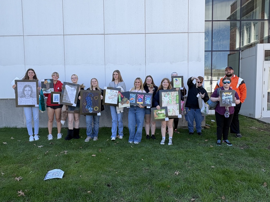 Art students and their artwork at CCC art show at Truman State University