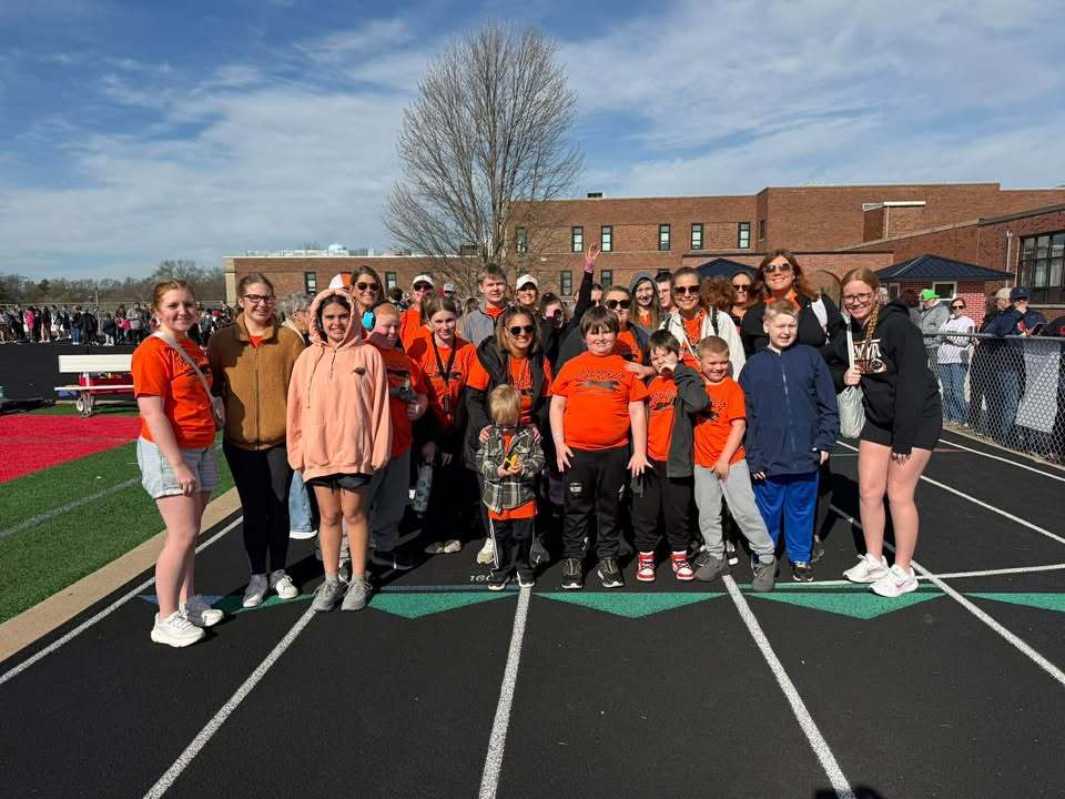 Students compete at Special Olympics with staff and buddies group picture