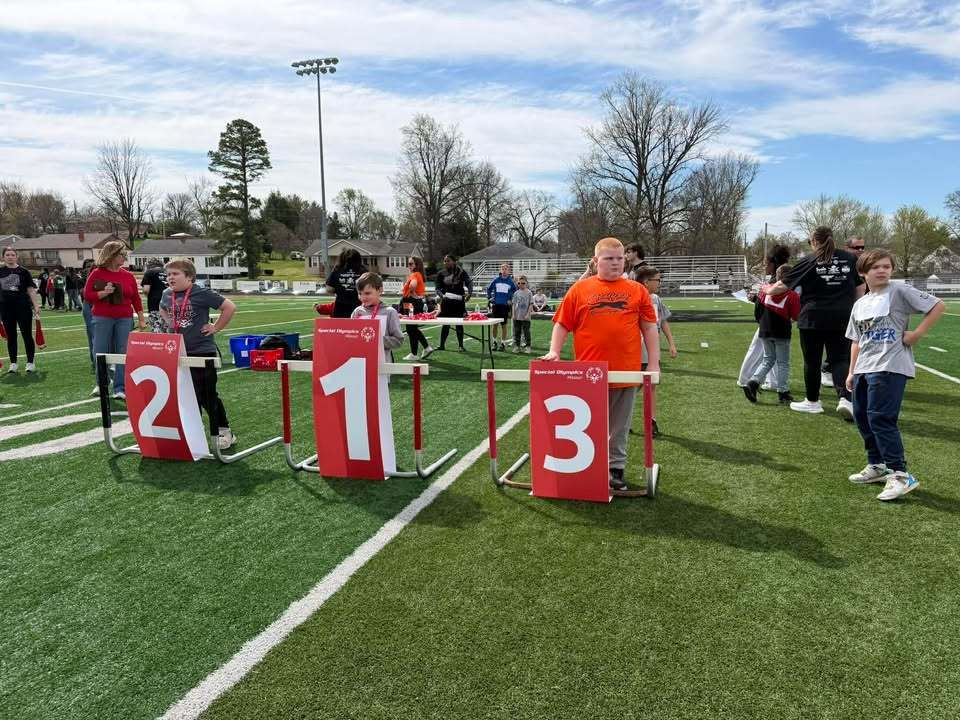 students receiving award at Special Olympics