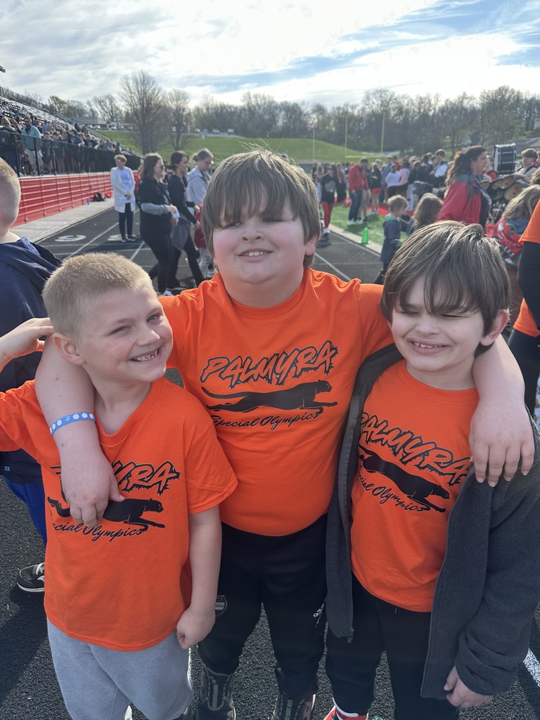 3 students at Special Olympics wearing their Panther shirts