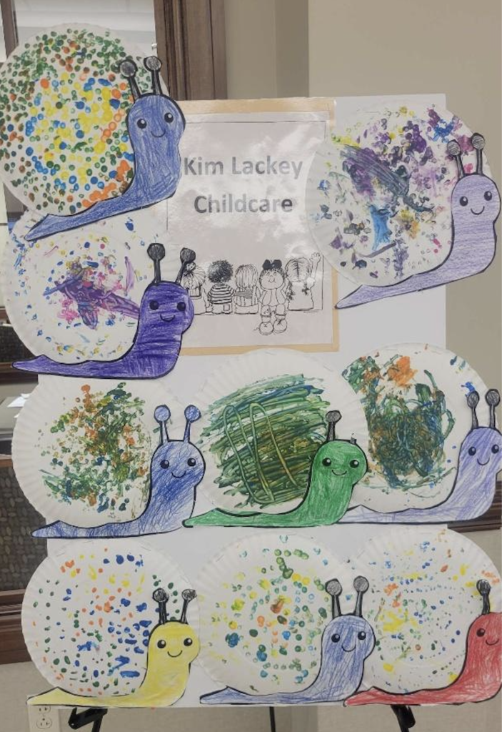 Artwork snails painted by early childhood students at Kim Lackey Childcare