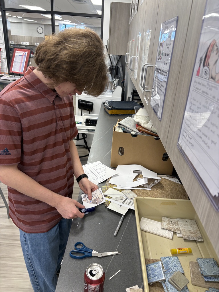 Interior design class using samples to design their model air bnbs