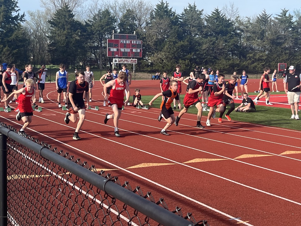 students taking off in a sprint at track meet