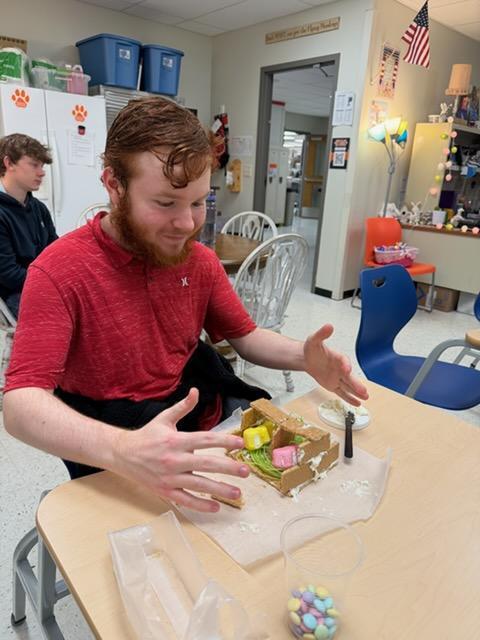 students create peep houses from graham crackers and icing in mythology class