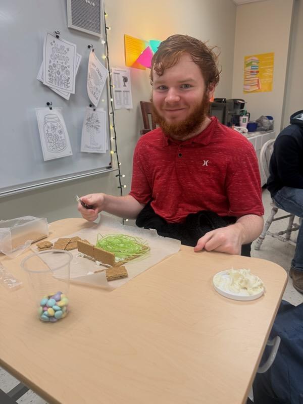 students create peep houses from graham crackers and icing in mythology class
