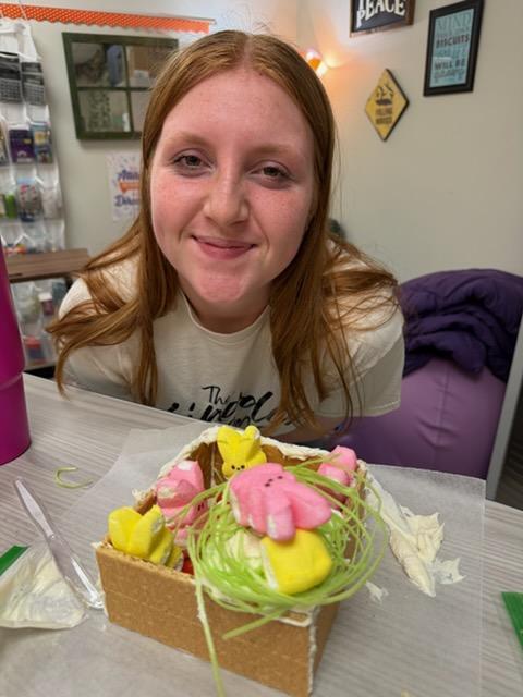 students create peep houses from graham crackers and icing in mythology class