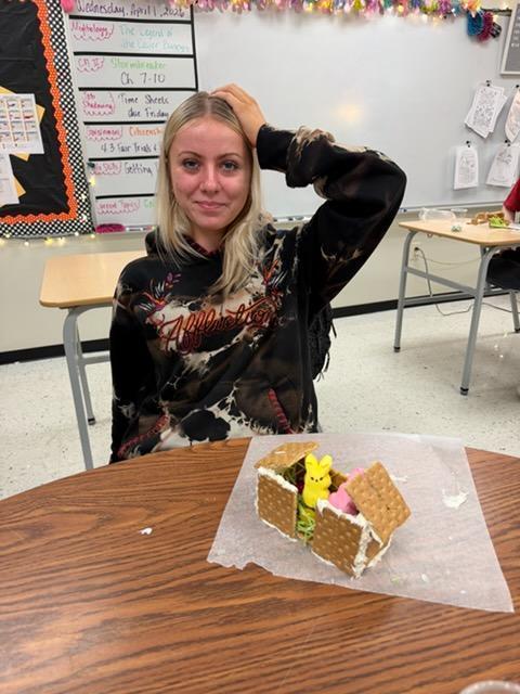 students create peep houses from graham crackers and icing in mythology class