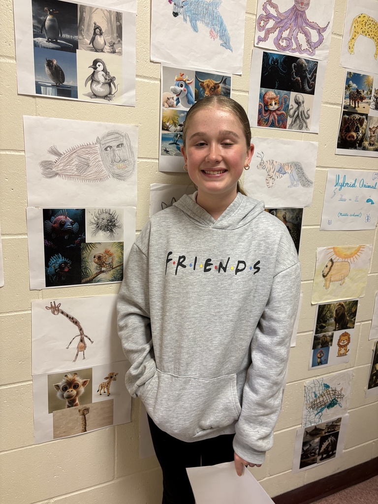 PACE open house student with their Hybrid animal display