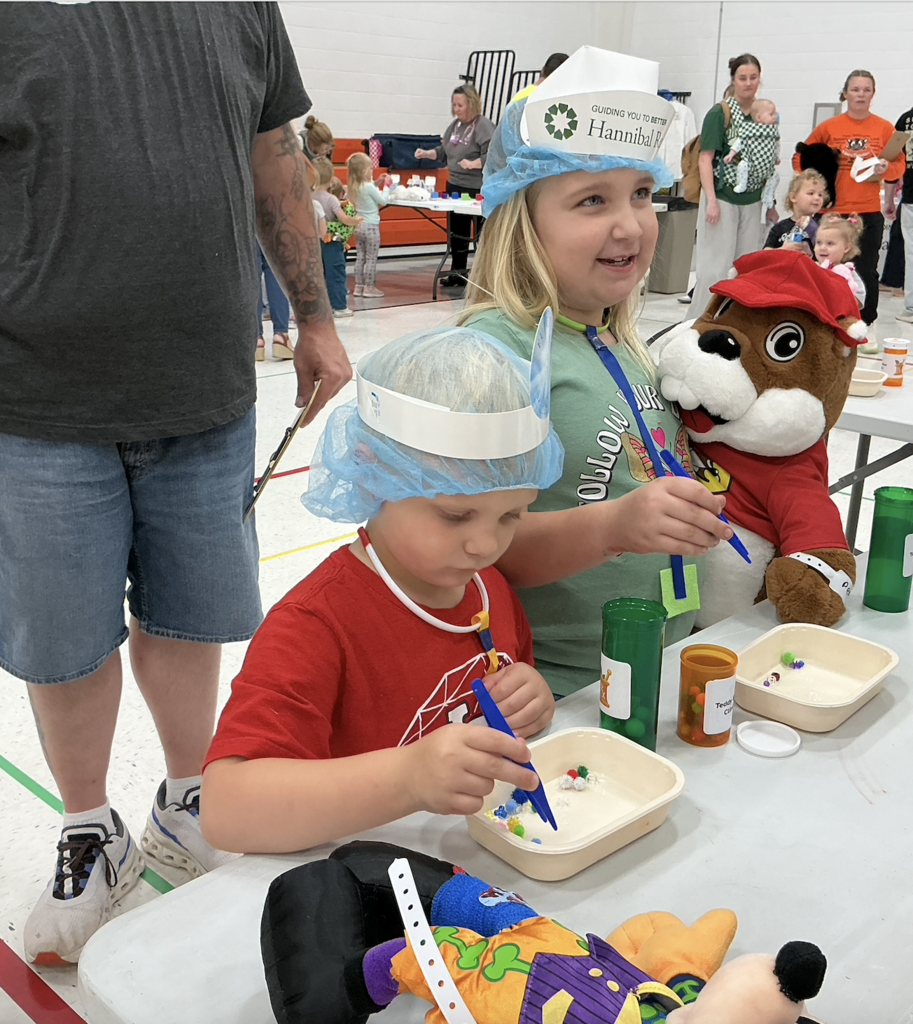 Students participating in PAT Teddy Bear Clinic