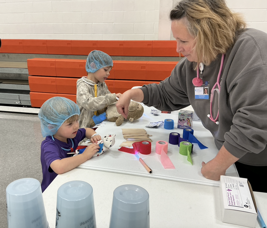 Students participating in PAT Teddy Bear Clinic