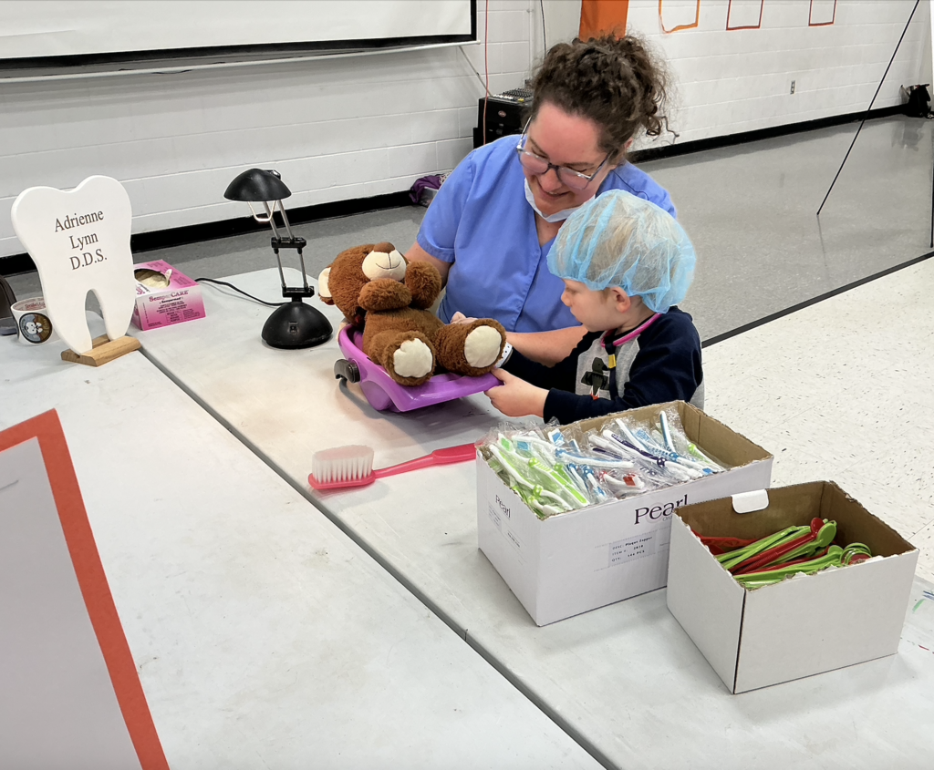 Students participating in PAT Teddy Bear Clinic