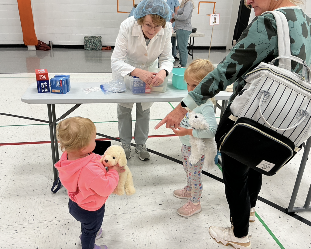 Students participating in PAT Teddy Bear Clinic