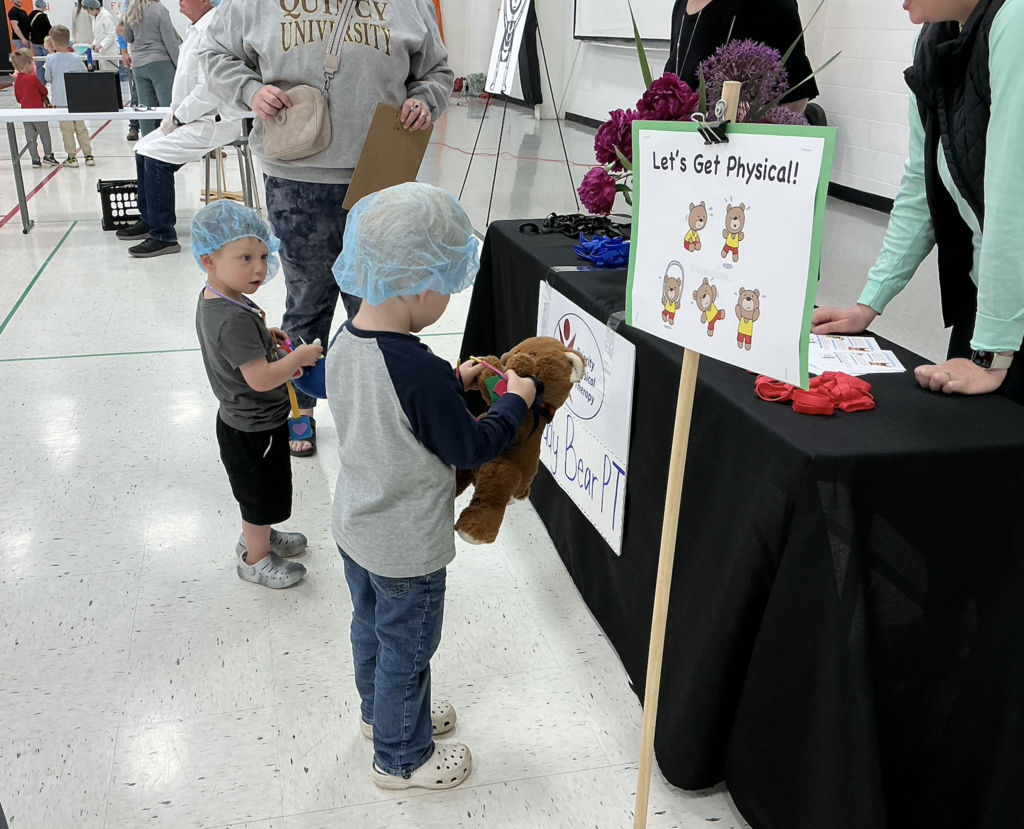 Students participating in PAT Teddy Bear Clinic