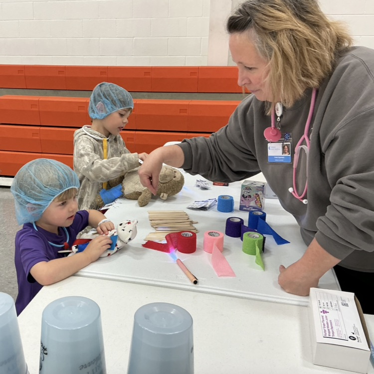 Students participating in PAT Teddy Bear Clinic