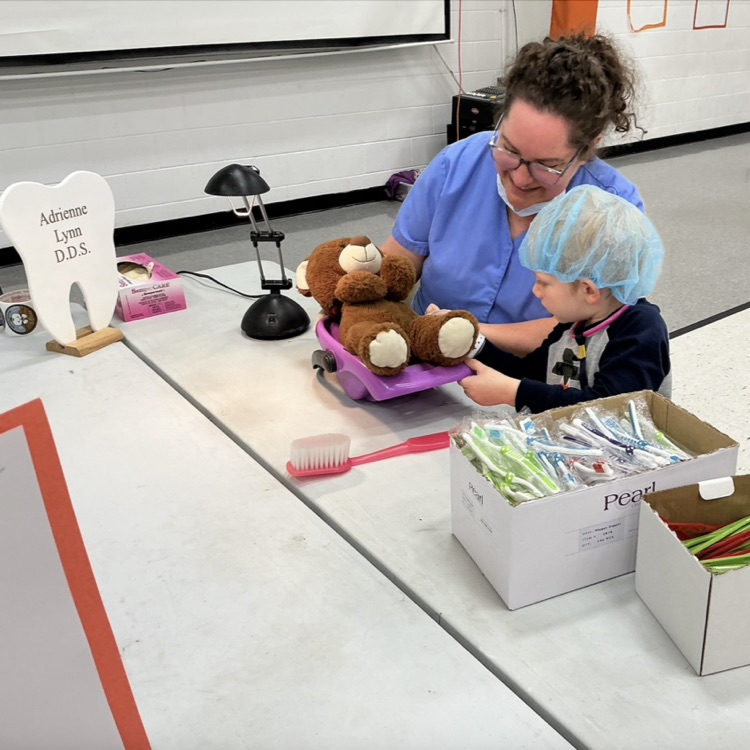 Students participating in PAT Teddy Bear Clinic