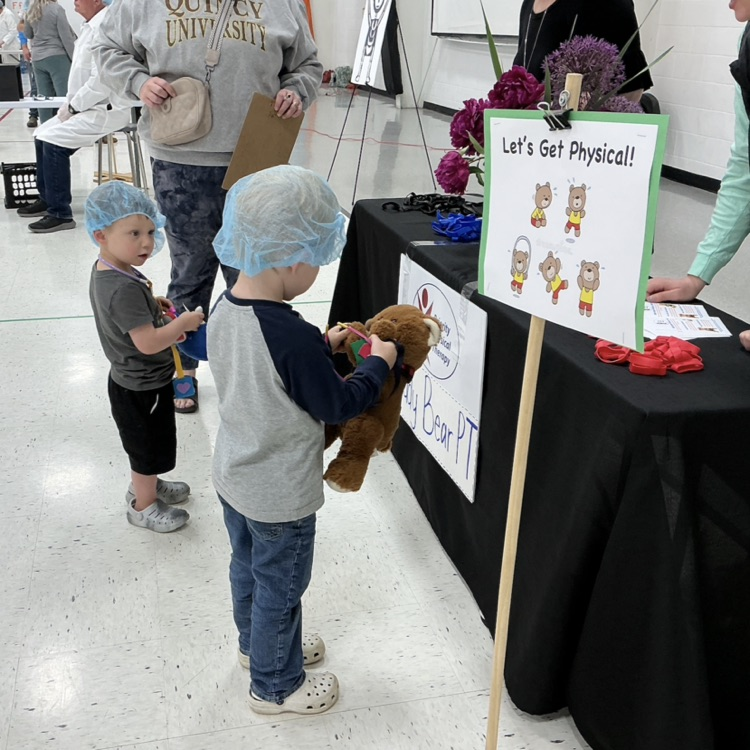 Students participating in PAT Teddy Bear Clinic
