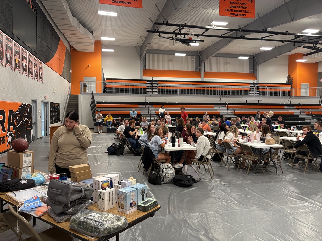 Seniors gather in high school gym to celebrate decision day