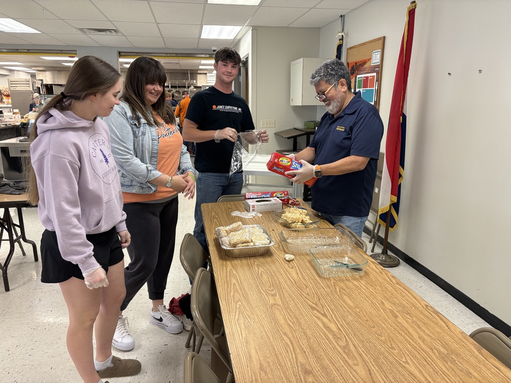 Key club members wrapping desserts for lunch