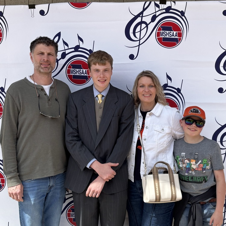 student with family at music festival 