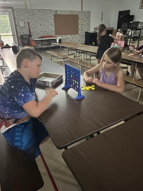 PES Students during summer school playing board games