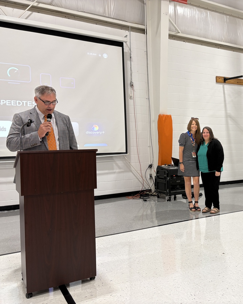 Mr Harper making new staff introductions