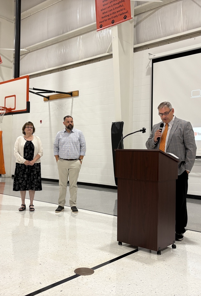 Mr Harper making new staff introductions