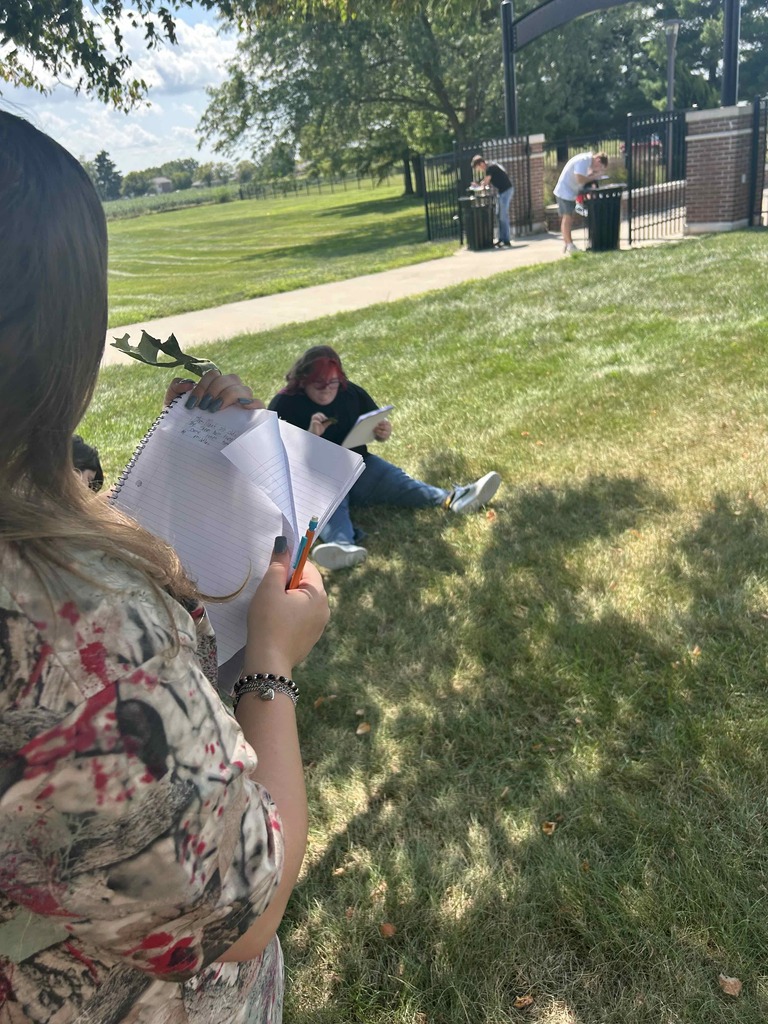 Biology students observing leaves lab