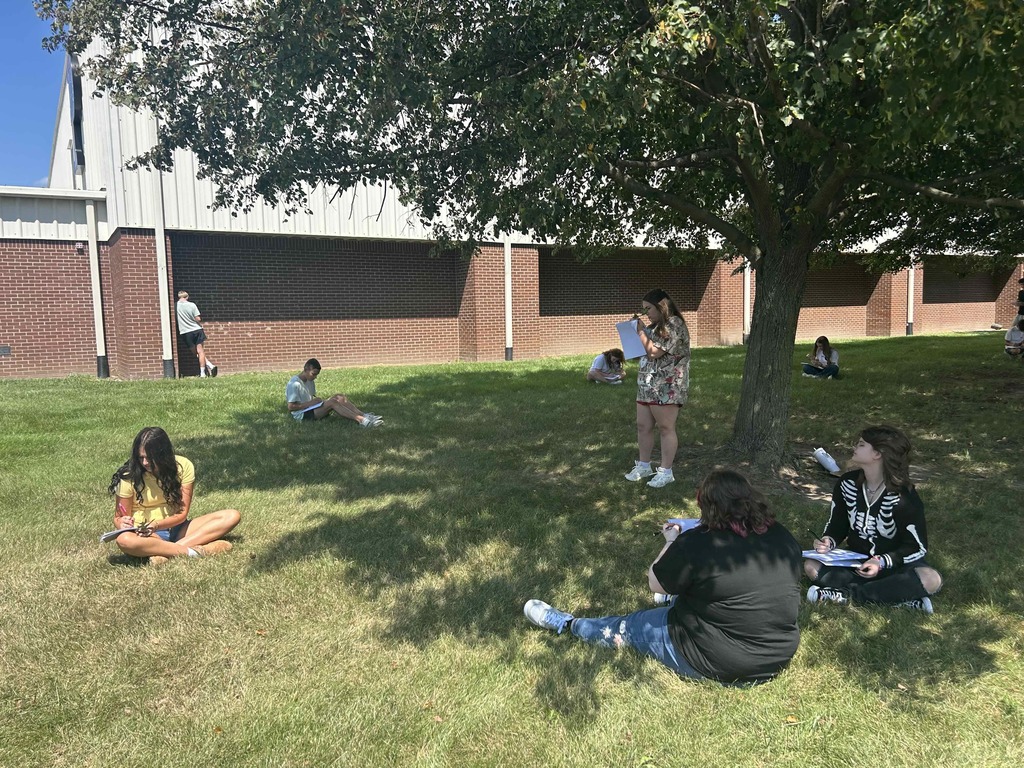 Biology students observing leaves lab