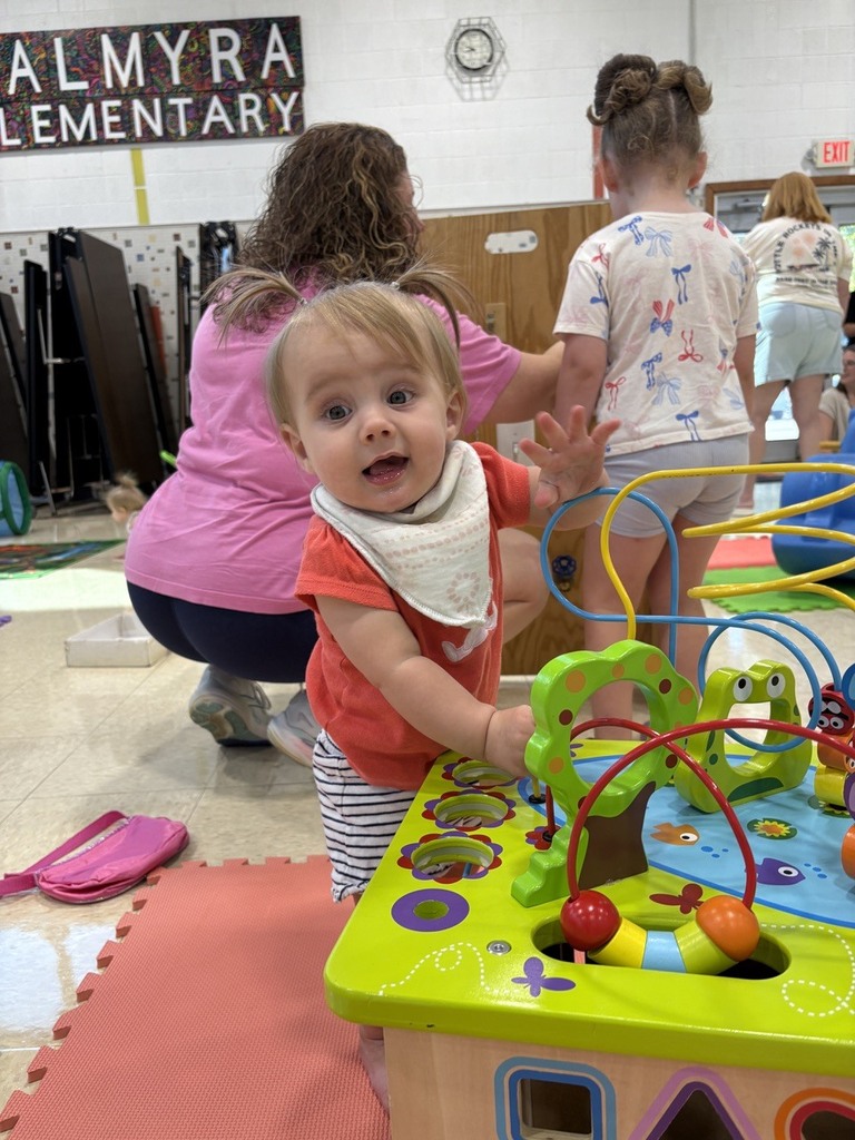 PAT playgroup participant playing with infant table