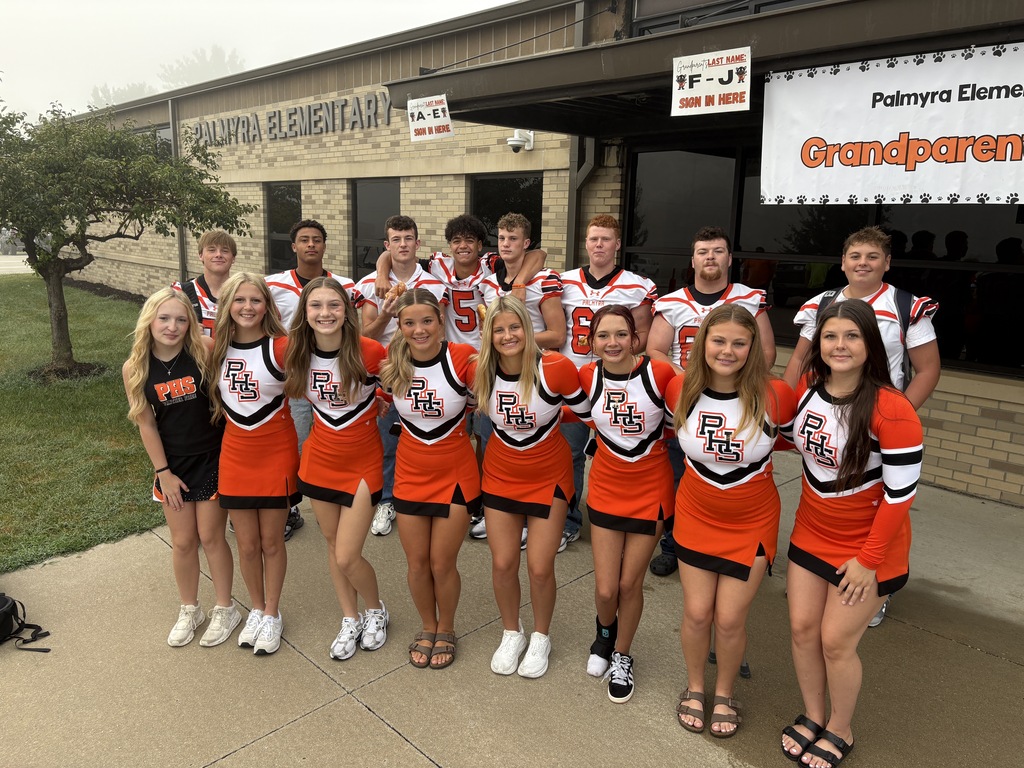 PHS Students greeting students at PES