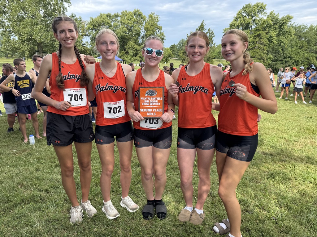 girls xc team with 2nd place plaque