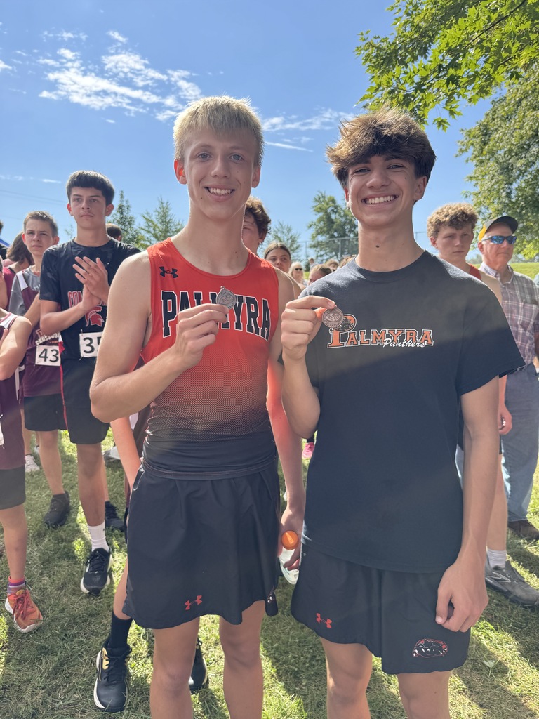 2 boys with XC medals