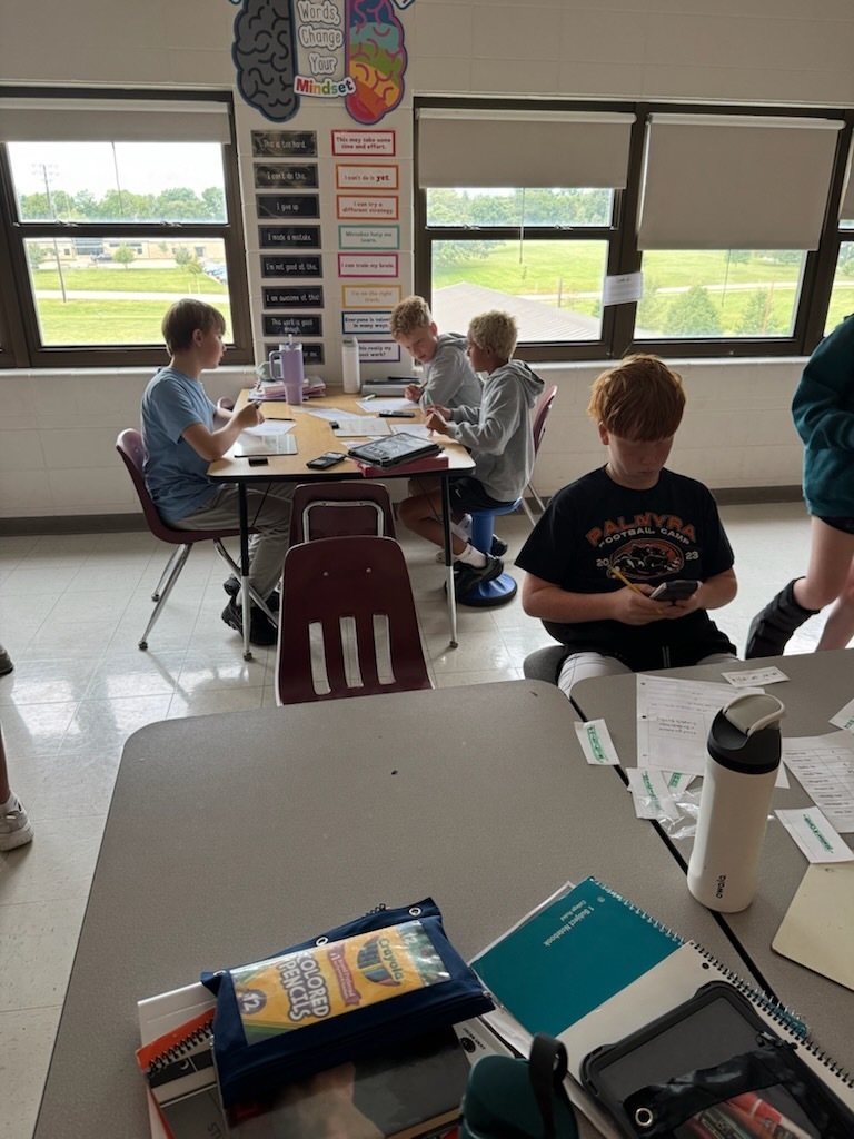 math students working on math lib in classroom