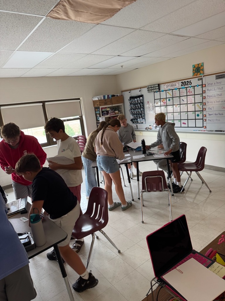 math students working on math lib in classroom