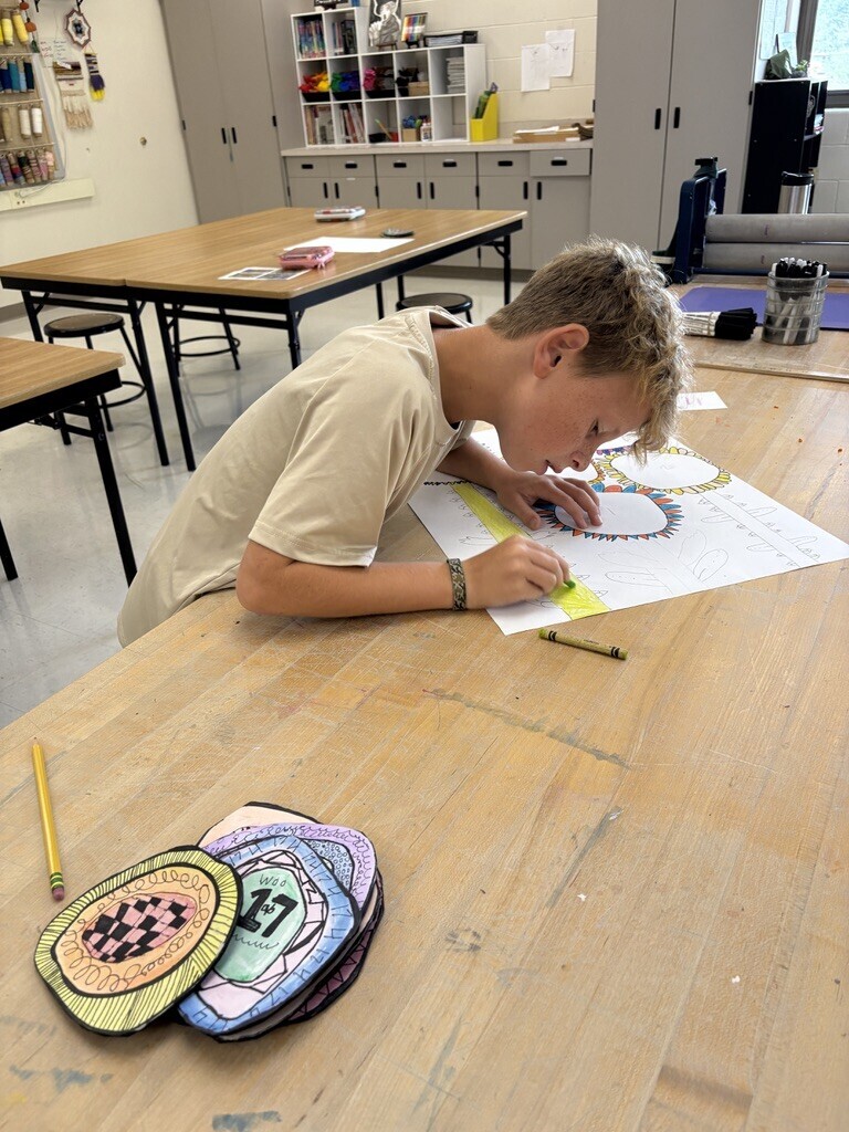 artist working on sunflower artwork poster