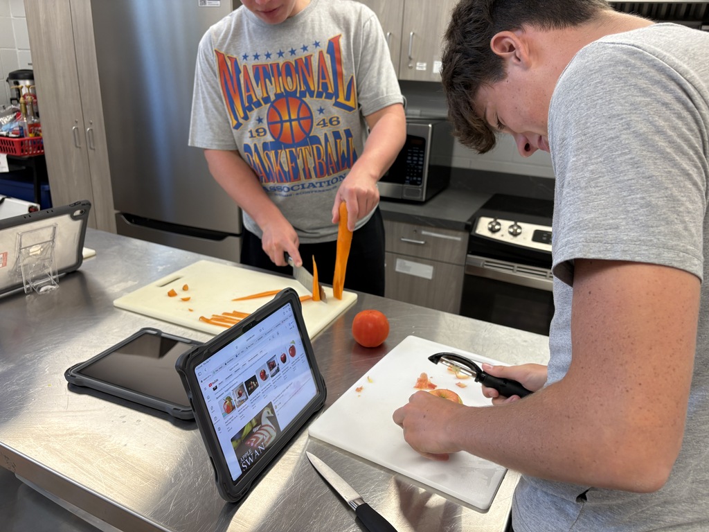 students creating vegetable and fruit creations
