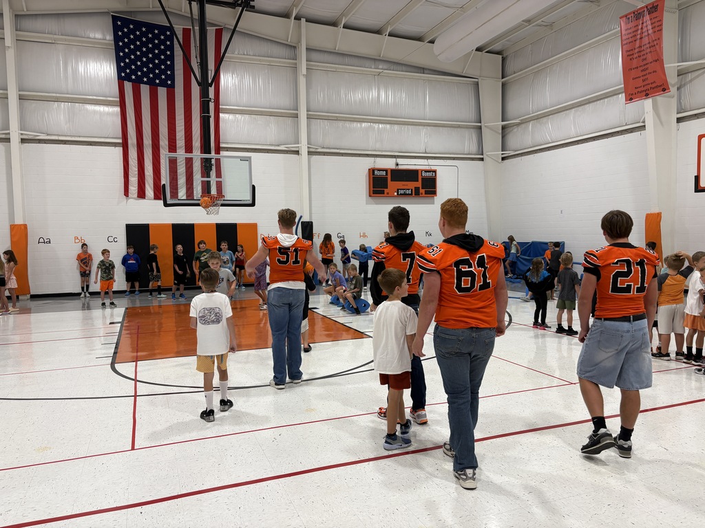 PHS Students playing in gym with students at PES