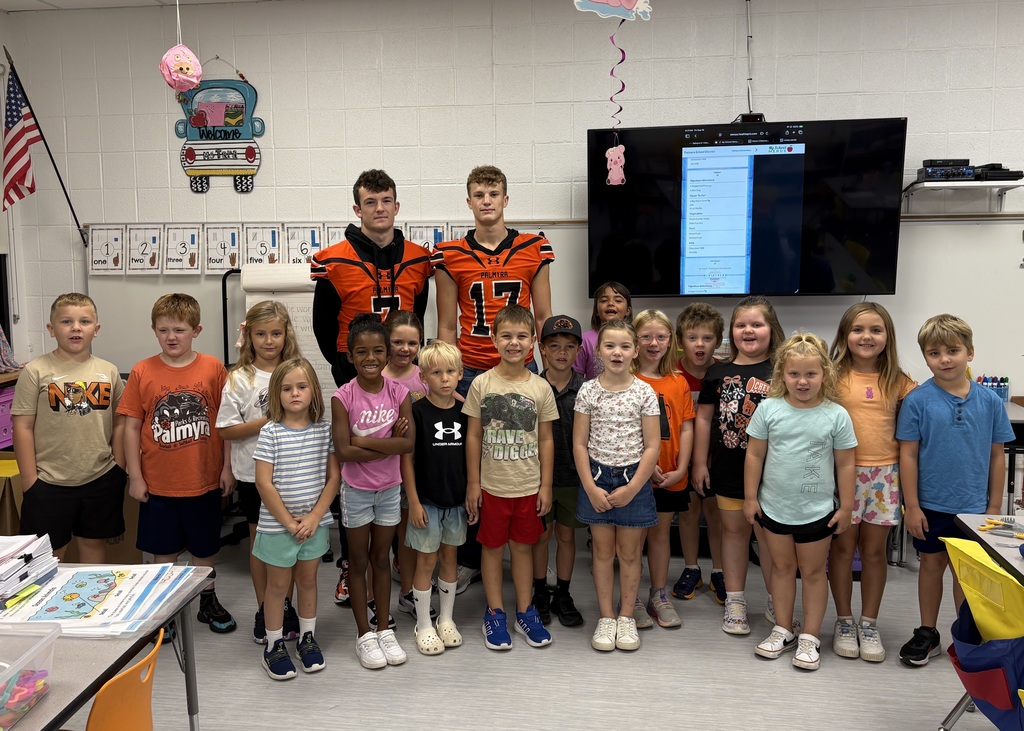 PHS students reading to 1st graders