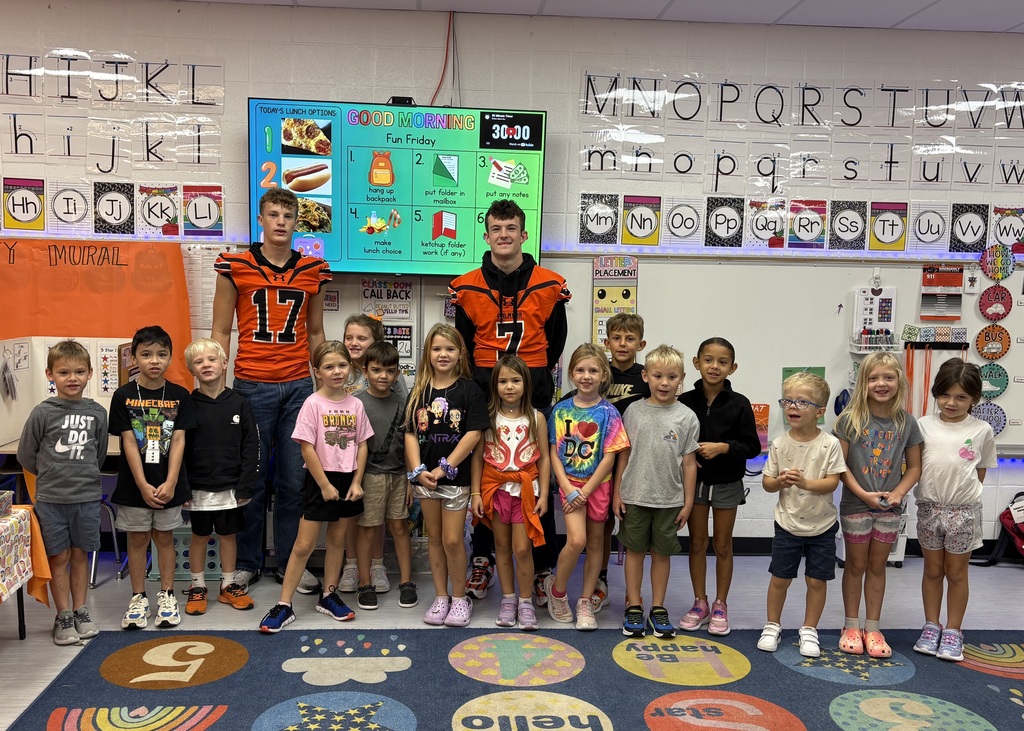 PHS students reading to 1st graders