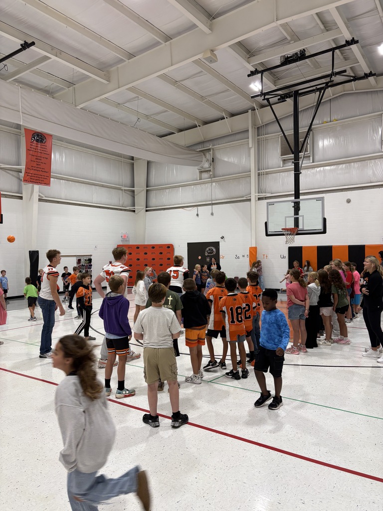 morning assembly at PES playing basketball