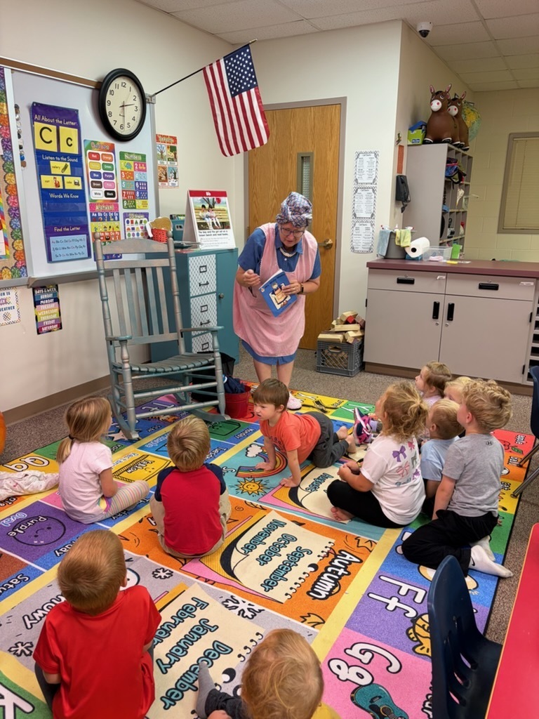 Mrs. Wishy Washy talking with Panther Cub students