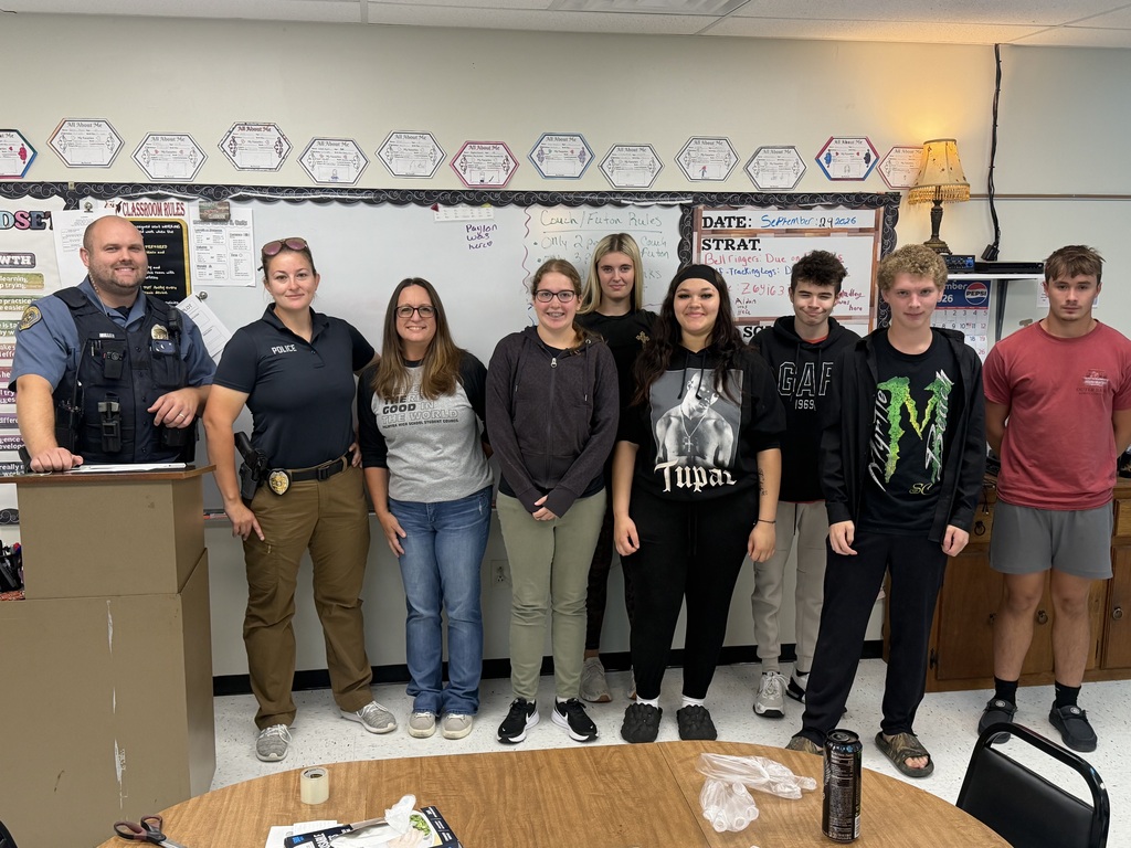 class with 2 officers and forensics teacher