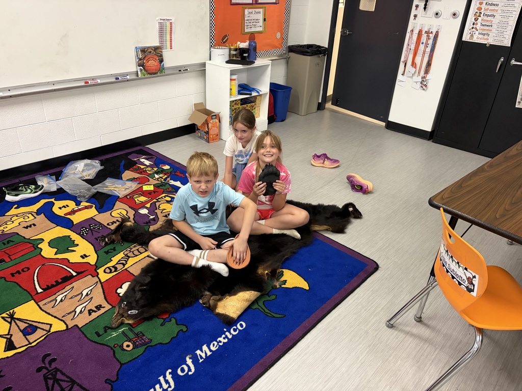 group of students exploring Lewis and Clark artifacts
