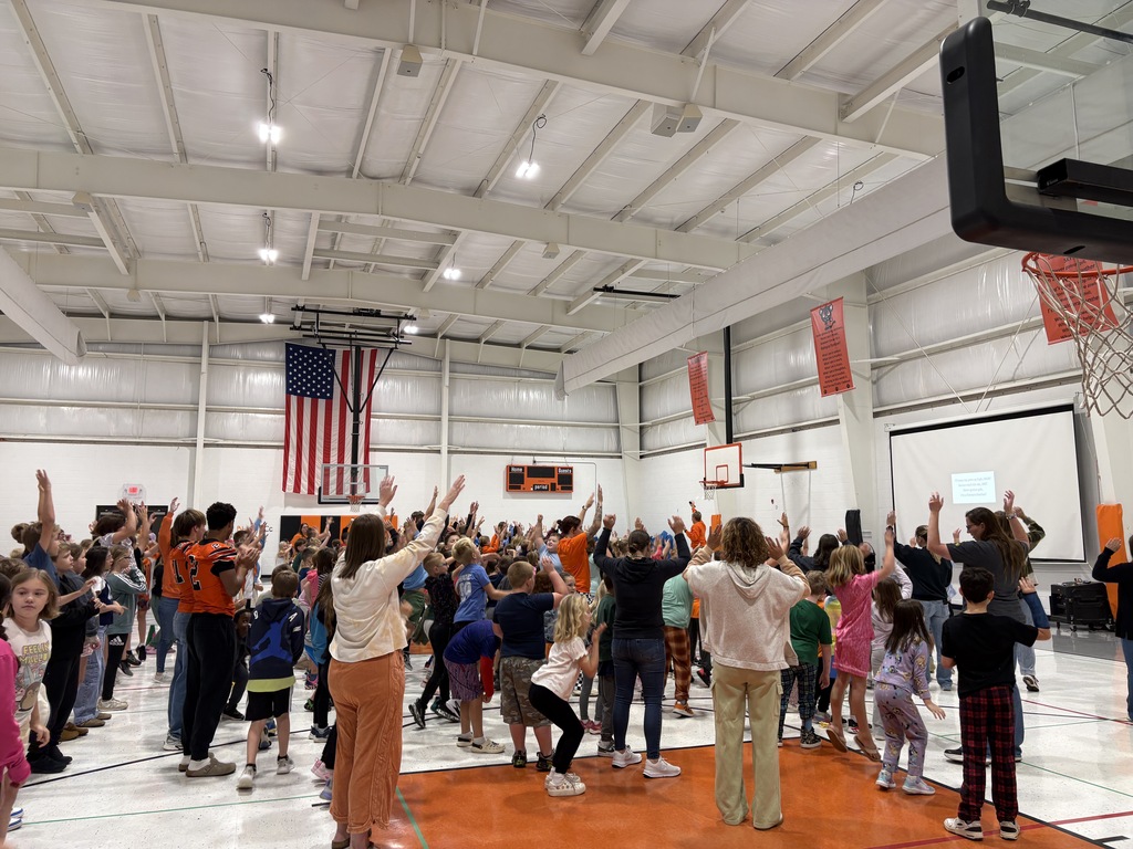 morning assembly students singing Panther song