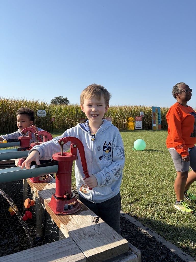 student on field trip at pumpkin patch